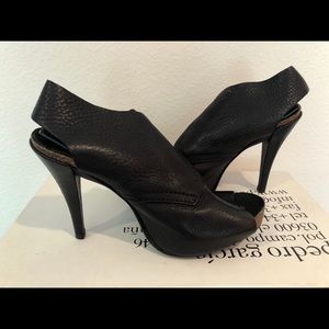 Pedro Garcia black pebbled leather heel.